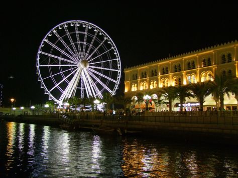 Al Qasba is located in the heart of sharjah. At Al Qasba, you can enjoy culture, entertainment and leisure attractions representing the very best from the Arab world and beyond. It’s a place where you can discover the highlights of contemporary Arabian arts among the galleries and theatre spaces. Sharjah United Arab Emirates, Arabian Art, Arab World, Sharjah, Arab Emirates, United Arab Emirates, City Guide, Night Life, Travel Guide