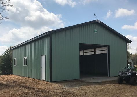 A 30' 0" x 40' 0" x 12' 4" Garage building with a Hartford Green roof, Patina Green siding and Hartford Green trim. For RICHARD/NANCY in ROSHOLT, WI (2017102054). Green Metal Building, Green Metal Siding, Shop Remodel, Cleary Buildings, Cabin Garage, Metal Shops, Shop With Living Quarters, Metal Garage Buildings, Green Garage