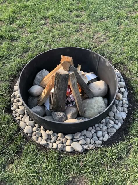 Small Rocks In Landscaping, Pebbles Around Fire Pit, Fire Pit Ideas Backyard Gravel, Small Firepits Backyard Ideas, Small Fire Pit Ideas, Round Pea Gravel Fire Pit Area, Seasonal Campsite Ideas Yards, Fire Pit Landscaping Ideas Pea Gravel, Fire Pit With Pea Gravel Backyard Ideas