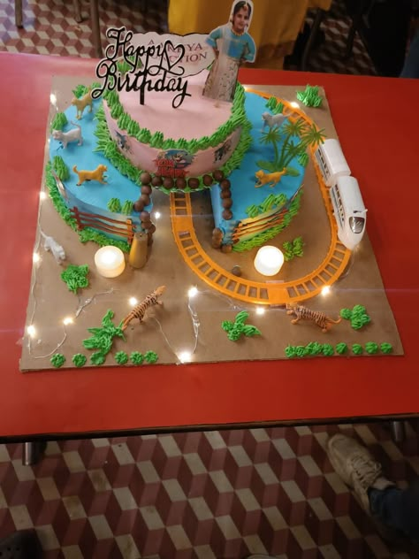 It's a tunnel train running cake theme Tunnel Cake Train, Train Track Cake, Titipo Train Cake, Moving Train Cake Ideas, Moving Train Cake, Train Cake Ideas, Train Theme Cake, Tunnel Cake, Bus Cake