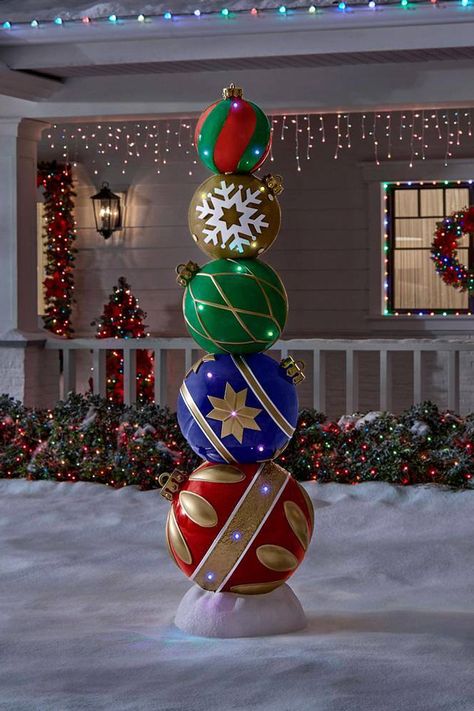 This gigantic sculptural stack of five oversized ornaments stands 7.5 ft tall, has bright LED illumination, and nest back inside each other for compact storage. Oversized Ornaments, Yard Sculptures, Christmas Yard Decorations, Entertaining Decor, Custom Displays, Christmas Yard, Christmas Display, Candy Land Christmas, Outdoor Christmas Decorations