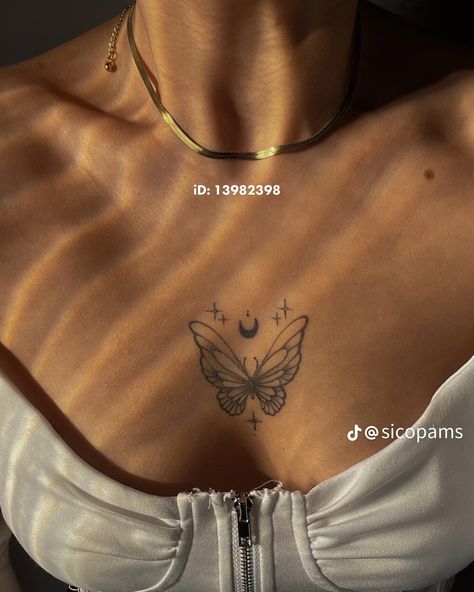 Small Tattoos Chest Female, Colorful Butterfly Tattoo On Dark Skin, Color Bone Tats Women, In Between Chest Tattoo Female Simple, In Between Chest Tattoo Female Butterfly, Butterfly Tattoo Chest Woman, Butterfly On Chest Tattoo, Colar Bone Tattoo For Women Meaningful, Small Tattoo On Chest