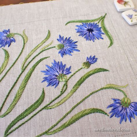 Do you ever get so excited about an embroidery project that it is constantly on your mind? That you're always looking forward to your next encounter with it?   Do you find yourself, in those daydream moments throughout the day, imagining your next stitching session when you can immerse yourself in Embroidery Cornflower, Cornflower Embroidery, Tablecloth Design, Tambour Beading, Clothes Embroidery Diy, Learning To Embroider, Hungarian Embroidery, Wool Embroidery, Embroidery Threads