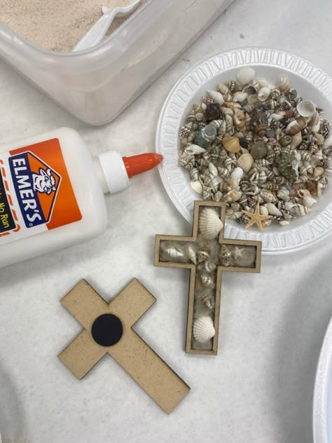 Sand and shells cross magnet craft. Shells and crosses from Amazon Ocean Theme Bible School Crafts, Vbs 2024 Craft Ideas, Cross With Shells, Beach Theme Vacation Bible School, Under The Sea Bible School Crafts, Vbs Under The Sea Crafts, Breaker Rock Beach Preschool Crafts, Breaker Rock Beach Vbs 2024 Preschool Crafts, Kids Vbs Crafts