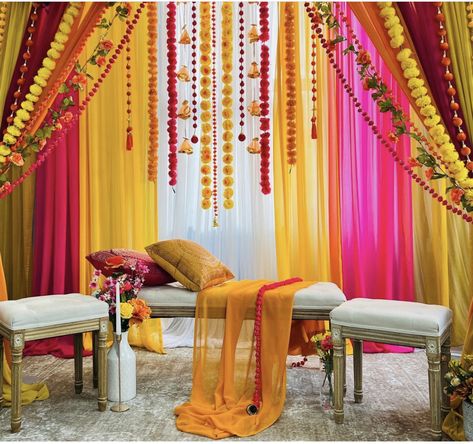 Mehandi Stage Decoration At Home, Pink Theme Haldi Decor, Pink And Yellow Indian Wedding Decorations, Pink And Yellow Mehendi Decor, Vibrant Haldi Decor, Mehndi Decoration Ideas, Haldi Decoration Ideas, Henna Night, Wedding Entrance Decor