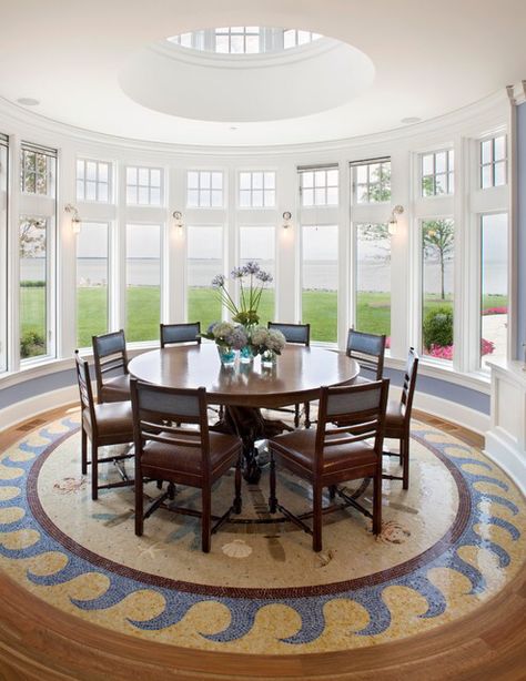 The main focus in this room is the circular skylight followed by the circular table and floor. There is a very strong feeling of radial symmetry in this room. Sunroom Dining Room Ideas, Sunroom Window Ideas, Sunroom Dining Room, Circular Dining Room, Sunroom Dining, Unique Dining Room, Cottage Coastal, Sunroom Designs, Round Dining Room