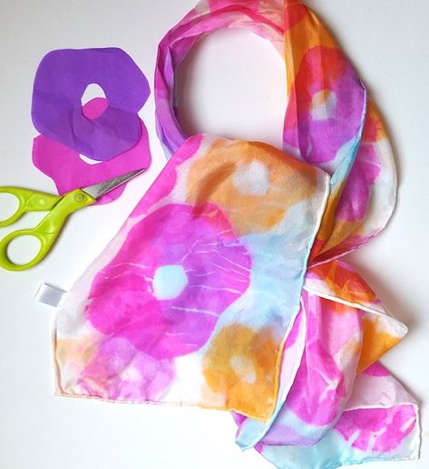 This silk scarf is dyed using tissue paper. You can create the shape out of the tissue paper and add it to the scarf. This is a great way to let the kids imagination go wild with creativity as they… Diy Silk Scarf, Homemade Gifts For Mom, Tissue Paper Art, Fabric Dyeing Techniques, Hand Dyed Silk Scarf, Tie Dye Crafts, Tie Dye Scarves, Diy Scarf, Kids Imagination