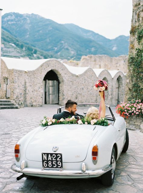 Alexandra and Joseph enjoyed a cruise through downtown Ravello in a 1961 Alfa Romeo Giulia 1600 Spider. The happy couple decided to continue their European adventure on a honeymoon to Santorini, Mykonos, and Paris. Lush Wedding, Amalfi Coast Wedding, Summer Wedding Decorations, Wedding Exits, Tuscan Wedding, Getaway Car, Martha Stewart Weddings, Wedding Music, Coast Wedding