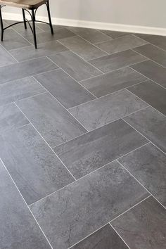 Herringbone Grey Tile Floor, Lvt Flooring Entryway, Best Flooring To Hide Dirt, Dark Grey Floor Tiles Bathroom, Gray Tile Basement Floor, Grey Entryway Tile Floor, Slate Gray Bathroom Floor, Dark Tile Bathroom Floor Master Bath, Modern Vinyl Flooring Bathroom