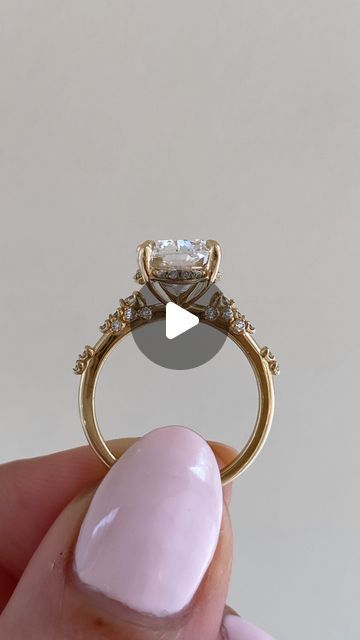 Ken & Dana Design on Instagram: "Loaded💍

Peony is a breathtaking blend of delicate elegance and radiant beauty. At the heart of this design lies a mesmerizing 3ct cushion cut diamond, cradled by a peek-a-boo halo. Along her band, blossoming diamond accents unfold, like petals in full bloom, adding an ethereal sparkle from every angle." Wedding Ring Finger Flip Off, Formal Diamond Ring With Halo Design And Open Shape, Wedding Butterfly Diamond Ring Fine Jewelry, Ken And Dana Engagement Rings, Jared Halo Engagement Ring Pnina Tornai, Cushion Cut Diamonds, Cushion Cut, Peonies, Halo