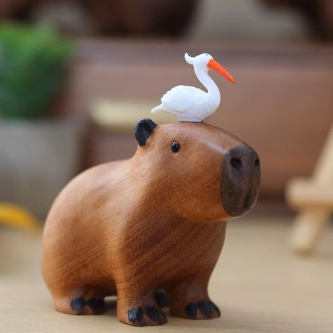 Our wood crafted #capybara ornaments are down to the last pieces. Been eyeing them? This is your chance to get them before they sell out. ~ #gift #capybaralover Playful Home, Orange Ornaments, Cute Capybara, Orange Wood, Clay Diy Projects, Nature Inspired Decor, Small Sculptures, Clay Animals, Cute Clay