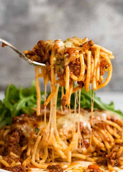 Forking lifting up cheesy Baked Spaghetti Italian Spaghetti Recipes, Cheesy Baked Spaghetti, Tin Eats, Spaghetti Bake, Best Freezer Meals, Baked Spaghetti Recipe, Spaghetti Casserole, Recipetin Eats, Recipe Tin