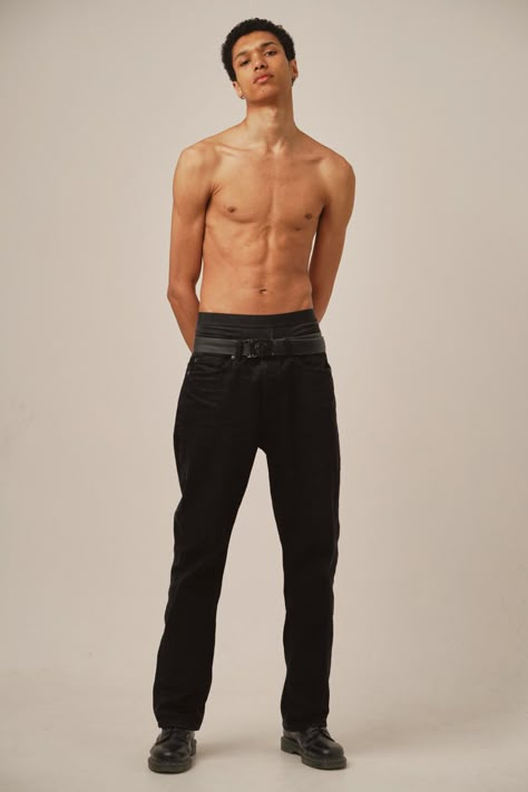 A skinny lightskin model posing in a studio for polaroids. Shirtless, wearing only a black pants and black shoes. Body Reference Real Life, Fullbody Pose References Man, Front Poses Reference, Shirtless Male Model Reference, Normal Male Body Reference, Full Body Man Reference, Half Body Poses Men, Neutral Pose Reference Male, Men Full Body Reference