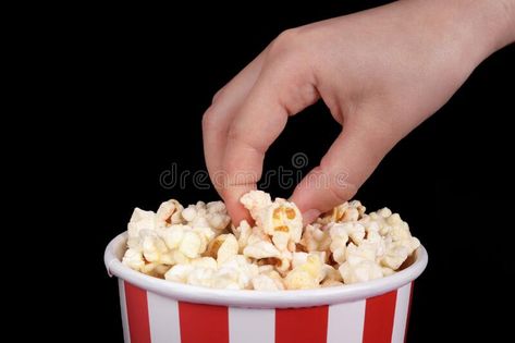 Hand takes popcorn from a paper box stock image Law And Justice, Paper Box, Popcorn, Stock Images, Stripes