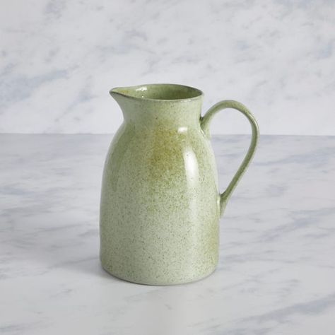 This stylish pitcher is made from high-quality stoneware and has a modern colourway that will complement an array of home decors. This pitcher is ideal for most as it is both dishwasher and microwave safe. All items in the Amalfi range have organic edges and a reactive glaze making each piece unique. African Faces, Pitchers Pottery, Pottery Jugs, Ceramics Pottery Bowls, Gift Wishlist, Pottery Glaze, Pottery Inspo, Pottery Pots, Cerámica Ideas