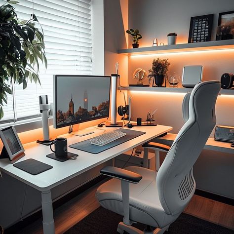 Serene and inviting home office space with white desk, ergonomic chair, desktop computer, and personal items for productivity and comfort. White Desk Setup, Organized Home Office, Office Inspiration Workspaces, Modern Home Offices, Minimalist Home Office, Home Studio Setup, Desktop Setup, Contemporary Home Office, Small Home Offices