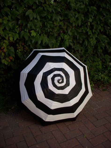 https://flic.kr/p/6UK1XD | Pop Brollies - Burton Swirl | Original Pop Brolly  Regularly price $90   Important note. These were used in fashion shows and were essentially prototypes while I nailed down ink and fabric combinations. As such, there is some cracking and could stick to themselves. This is why they're on sale so cheap. I 'm just trying to recoup my cost only so I can buy more supplies. Mode Steampunk, Tim Burton Style, Catty Noir, Winter Typ, Night Circus, Under My Umbrella, Singing In The Rain, Umbrellas Parasols, Fashion Shows