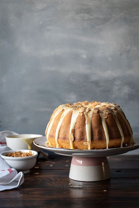 This is an easy recipe for a moist vanilla bundt cake with a hint of white chocolate flavor. Cover it with a white chocolate ganache for the perfect dessert. #vanilla #white #chocolate #easy #homemade #cake #bundt #dessert #ganache #eggwhites White Chocolate Cake Recipe, Vanilla Bundt Cake Recipes, White Ganache, Vanilla Bundt Cake, White Chocolate Glaze, Best White Chocolate, White Chocolate Cake, Dessert Cakes, White Chocolate Ganache