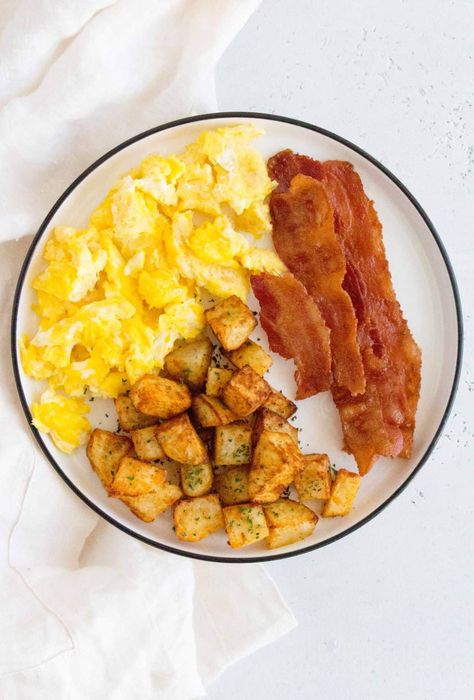 air fryer breakfast potatoes with scrambled eggs and bacon Bacon And Scrambled Eggs, Breakfast Ideas Bacon And Eggs, Eggs And Potatoes Breakfast, Breakfast Ideas Air Fryer, Airfryer Ideas, Air Fryer Breakfast Potatoes, Bacon And Eggs Breakfast, Breakfast Potatoes Recipe, Air Fryer Breakfast Recipes