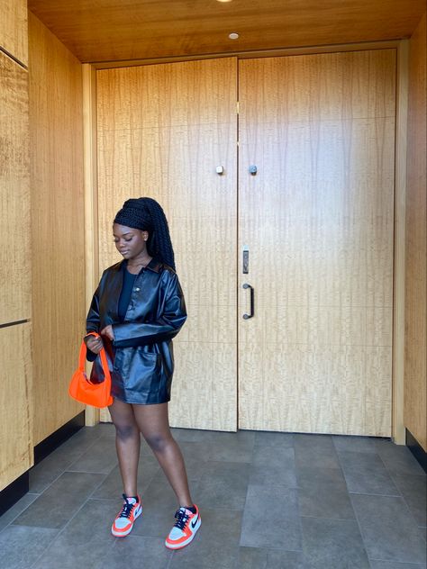 Orange bag with starfish air jordan 1 lows. Leather jacket with black dress. Orange Jordans Outfit, Electro Orange Jordan 1 Outfit, Orange Telfar, Air Jordan 1 Orange, Jordan 1 Orange, Orange Jordan Shoes For Streetwear, Electro Orange Jordan 1, Air Jordan 1 Low, Orange Bag