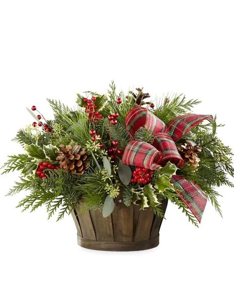 Welcome your loved one's home with a piece that is perfect for the holiday season. A basket filled with assorted Christmas greens, seeded eucalyptus, variegated holly and holiday cheer brings the magic home. Greet those with an arrangement that will bring warmth and joy to any room its placed in. #CampbellsFlowers Christmas Greens, Holiday Baskets, Christmas Centers, Christmas Flower Arrangements, Christmas Floral Arrangements, Christmas Centerpieces Diy, Seeded Eucalyptus, Holiday Ribbon, Holiday Flower