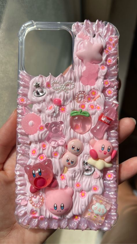 Super cute unique custom phone case, handmade, made-to-order, and fully customizable phone case for all iPhone types + Android. ( ˘ ³˘) we choose special charms especially for you. choose your color, theme, and we’ll make it your own!! @babycasexoxo #kawaii #phonecase #customphonecase #phonecaseidea #phonecasedesign #cutephonecase #myphonecase #diykawaii #diyphonecase #decodenphonecase #uniquephonecase #iphonecase #kirbyphonecase #kirby #animephonecase #aestheticphonecase Kirby Decoden Phone Case, Phone Case Charms Diy, Diy Decoden Phone Case, Decoden Phone Case Ideas, Kawaii Phone Case Diy, Decoden Phone Case Sanrio, Chunky Phone Case, Kirby Phone Case, Y2k Iphone Case