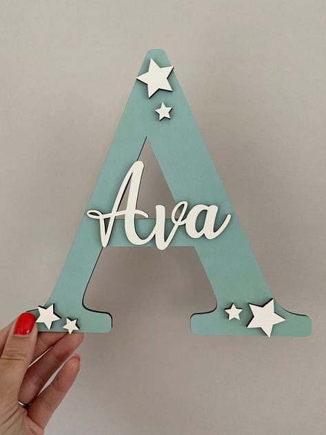 Craft stunning initial wall art using DIY letter decor techniques. Perfect for personalizing doors or creating unique name signs in any room! Name Letters Diy, Diy Letter Decor, Big Wooden Letters, Baby Name Wall Art, Kids Door Signs, Door Name, Initial Wall Art, Wooden Toy Boxes, Personalized Wall Decor