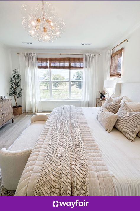 Bedroom inspiration, right this way. Bring in statement lighting, neutral bedding, and rattan window shades to make this look yours. Neutral Bedding, Master Room, Statement Lighting, Big Windows, Bedroom Refresh, Farmhouse Bedroom, Master Bedrooms Decor, Window Shades, Home Reno