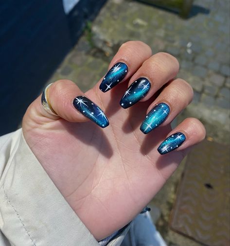 Acrylic Nail Designs Dark Blue, Blue And Silver Star Nails, Dark Blue Celestial Nails, Blue Space Nails, Nightcourt Acotar Nails, Celestial Nail Art Starry Nights, Dark Blue Cat Eye Nails, Nasa Nails, Magnet Nail Polish Designs