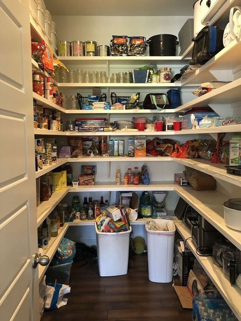 I have loved my big pantry but was always embarrassed when someone asked where my garbage was and they would walk into my unorganized-wreck of a pantry. Check out my before and after of my pantry makeover! I invite everyone inside now! Here is my before...When we built, we extended our pantry so have more shelving and had them add two more shelves above what they had installed because there was about a 5' gap between the top shelf they put in and the ceiling. We had our trash can… Party Pantry, Big Pantry, Diy Wall Sconces, Hidden Tv Cabinet, Fairy Lights In Trees, Beadboard Paneling, Large Glass Jars, Diy Coffee Bar, Pantry Remodel