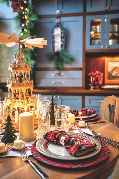 A Holiday Haven in Vail - Mountain Living Diy Christmas Centerpiece Ideas, Table With Candles, Diy Christmas Centerpiece, Christmas Pyramid, Christmas Centerpiece Ideas, German Christmas Pyramid, Multiple Candles, Ornaments To Make, Racquet Club