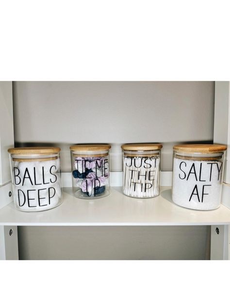 Spice up your bathroom with these adult humour bathroom storage jars! They’re perfect for storing q-tips, hair ties, cotton balls, and Epson salts! They make a great a house warming gift guaranteed to make everyone laugh Cotton Balls And Q Tip Storage, Funny Bathroom Jar Labels, Men’s Bathroom Ideas, Ball Jar Labels, Couples Jar, Bathroom Storage Jars, Bathroom Jokes, Bathroom Jars, Joke Gifts