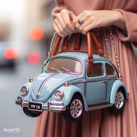 Volkswagen Handbag 🚗👜🌟 #VWHandbag #AutomotiveStyle #RetroFashion Carry your essentials in style with the Volkswagen Handbag. This unique accessory draws inspiration from the iconic VW design, adding a touch of automotive flair to your fashion ensemble. Elevate your look with the Volkswagen Handbag, where every outing becomes a chic journey through the vibrant history of Volkswagen. 🌈👛✨ Funky Purses, Van Ideas, Inspired Handbags, Unique Handbags, Vw Van, Hit The Road, Futuristic Architecture, Elevate Your Look, Beetles