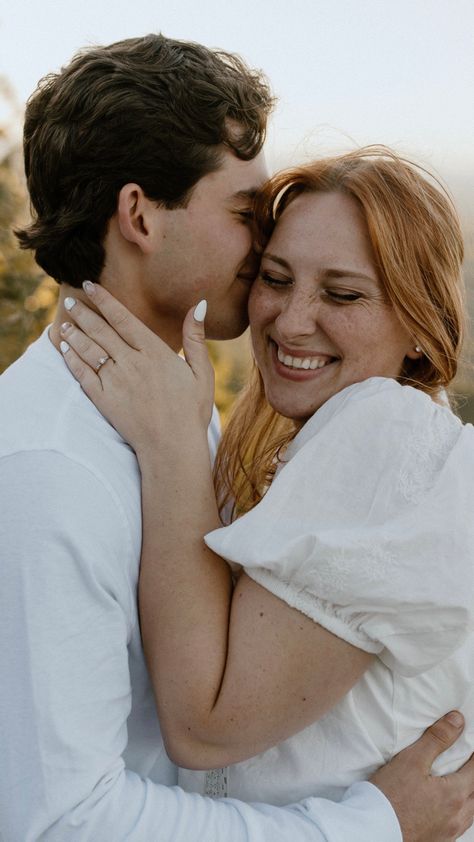 sunset engagement pictures in the smokey mountains😍 flowy white dress and engagement ring. engagement photo shoot inspo couples Plus Size Engagement Photo, Cloudy Engagement Pictures, Windy Engagement Photos, Shy Couple Poses, Plus Size Couple Poses, Engagement Photos Plus Size, Plus Size Couple Photoshoot, Plus Size Engagement Photos, Rainy Engagement Photos