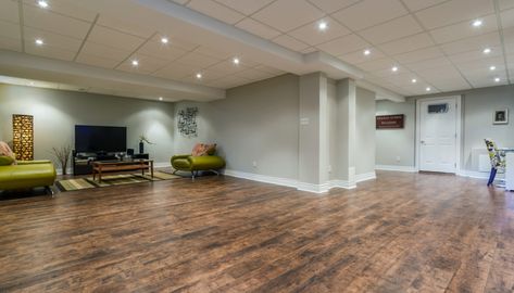 Semi Finished Basement, Rustic Basement Ideas, Flooring For Basement, Tile Basement Floor, Basement Rooms, Gray Basement, Cheap Hardwood Floors, Best Flooring For Basement, Ideas For Basement