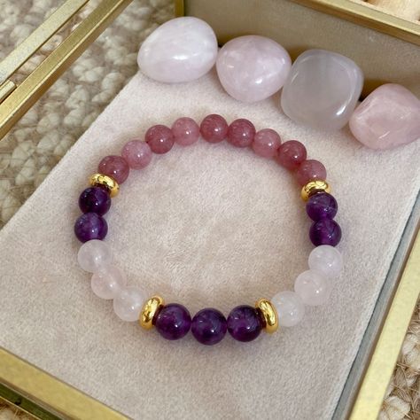 Hello! Welcome to Metrik Jewellery, thank you so much for being here and supporting my small business!  As a female entrepreneur, I am very happy and proud to present my designs to you! Your satisfaction is my number one priority in this store! Details:  - This ' Attract Love 'Bracelet is made of the following raw crystals: 8mm Amethyst, Rose Quartz and Pink Jade. -While designing this 'Attract Love' bracelet, I chose real raw stones that are most compatible with ' Attract Love '. -This bracelet is designed for you and your loved ones. I hope you love it and it brings you luck! -I hope all your dreams become your reality easily! -I will make your bracelet specifically for you with so much love and care. I would like you to know that the number of raw stones in your bracelet may increase or Manifest Love, Pink Jade, Attract Love, Quartz Pink, Love Spell, Love Bracelet, Love Bracelets, Amethyst Stone, Crystal Bracelets