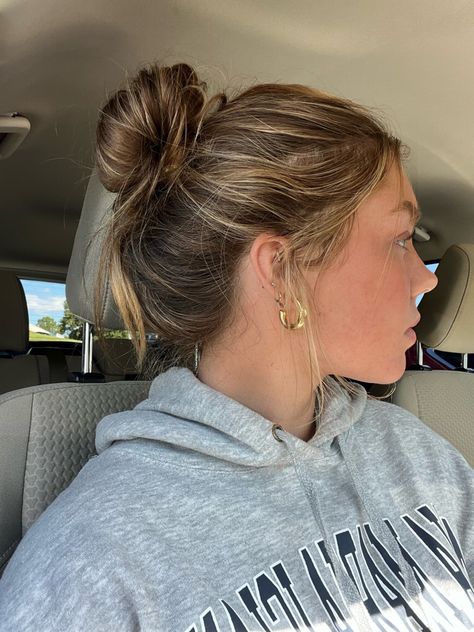 earrings | piercings | bun | hair Hair In A Bun Aesthetic, Blonde Hair In A Bun, Beach Messy Bun, Messy Bun Going Out, Airport Hair, Hairstyles With Accessories, Brown Hair Messy Bun Aesthetic, Hairstyles For Blondes, Hoodie Hairstyles