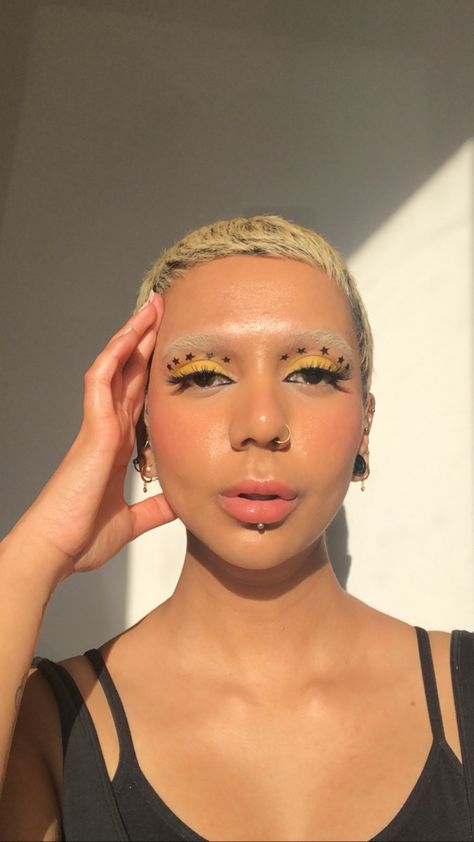 Yellow eyeshadow and star eyeliner ✨ I used @thebodyshopuk star stamp liner. Eyeliner Stamp Star, Star Stamp Eyeliner, Star Eyeliner Stamp, Star Stamp Makeup, Cloud Eyeliner, Yellow Eyeliner, Star Eyeliner, Yellow Eye Makeup, Eyeliner Stamp