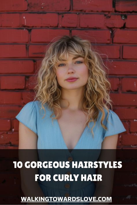 Woman with curly hair in a blue dress stands against a red brick wall. Soft Natural Haircut, Natural Wavy Hairstyles, Shoulder Length Curls, Gorgeous Hairstyles, Medium Curly, Blonde Curls, Tousled Waves, Natural Wavy Hair, Short Curly Bob