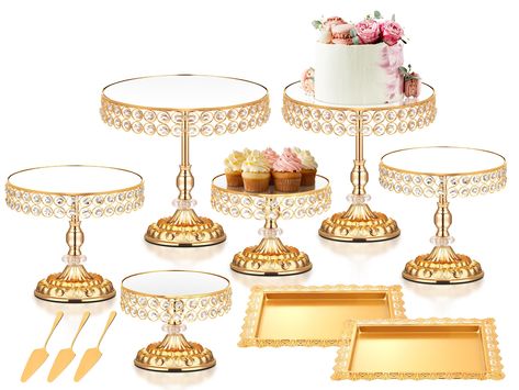 PRICES MAY VARY. Dessert Cake Stand Set --- This dessert display set contains 6 pieces of gold cake stands in different sizes, they are approximately 12 inch, 11 inch, 10 inch, 9 inch, 8 inch and 7 inch in diameter. Also included are two cake trays, 3 cake spatulas and a pair of gloves. The cake trays measure approximately 14 x 11 inches. Elegant Design --- The round cake display stand has an elegant European design. Attractive crystal edges, a stylish carved base and a beautiful centre column c Grooms Cake Tables, Gold Dessert Table, Dessert Table Display, Cake Display Stand, Pastry Display, Gold Cake Stand, Gold Dessert, Metal Cake Stand, Round Cake Stand