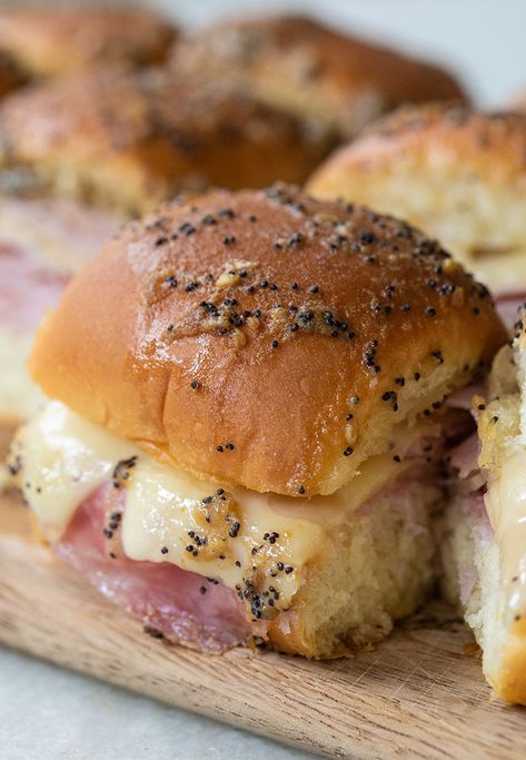 I can't say enough incredible thing about these savory and beyond delicious ham and cheese sliders on Hawaiian rolls! They are simple to make and perfect for parties! #Recipes #Ham #Cheese #Sliders #HandandCheeseSliders #Appetizers Hot Ham And Cheese, Roll Sliders, Pizza Sliders, Ham And Swiss Sliders, Bunco Ideas, Onion Butter, Savory Ham, Ham And Cheese Sliders, Hawaiian Roll Sliders