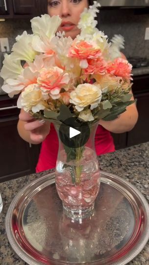 1.2M views · 3.5K reactions | Easy DIY Flower Arrangement 🌸 | Easy DIY Flower Arrangement 🌸 

🎬 This video was produced by Network Media and Kyle & Mistie Knight | By Sixty Second Inspiration | Clear glue and you want it to
bubble up like that just about marbles or stones You can see
I've got glitter on the bottom there. Ain't that beautiful?
You want those bubbles in there and they'll actually dry and
the cool thing is is that these stones will make the glue rise
and you just fill the bottle My aim isn't the best but look at
how pretty that is and then, you're going to take some
artificial flower Choose the one that's going to be the
centerpiece of your flower design and it's going to go
right in the middle. And see these stones will hold it in
place. I really like the addition of the Flower Arrangements Diy Artificial, Diy Flower Arrangement, Fake Flower Arrangements, Event Decorating, Bubble Up, Diy Cleaning Solution, Clear Glue, Flower Arrangements Diy, Store Ideas