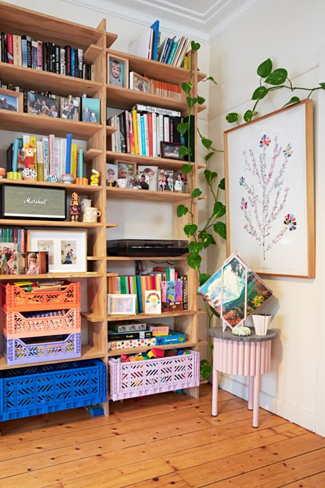 Emily Green Melbourne House Tour Photos | Apartment Therapy Eclectic Toy Storage, Children’s Storage, Living Room With Kids Toys, Toy Storage For Living Room Small Spaces, Craft Rooms In Small Spaces, Craft Shelf Organization, Book Organization Small Spaces, Playroom Small Space, Book Storage Ideas For Small Spaces