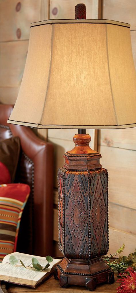 Southwestern Table Lamp: A Native American influenced design on faux wood brings Southwest style to the resin Cordova Southwestern Table Lamp in a black, brown and red finish with a hexagonal taupe fabric shade. #rusticlighting #rusticlamps #westernlighting Southwestern Table, Western Lamps, Rustic Table Lamps, Black Forest Decor, Regal Design, Rustic Lamps, Western Homes, Rustic Lighting, Western Home Decor