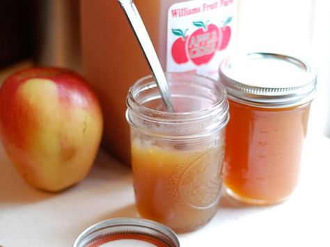 Because apple cider is unfiltered, this jelly looks a bit cloudy in the jar—much like a glass of apple cider. The intense, tangy apple flavor is complemented by a luxurious, molasses note from the brown sugar. I used cinnamon sticks, cloves, and lemon zest, but any toasty, fall-friendly spices would be delicious. Experiment with whole allspice berries, star anise, cardamom pods, or slices of fresh ginger. Apple Cider Jelly, Jelly Food, Caramel Apple Cider, Marmalade Recipe, Apple Jelly, Canning Jam, Apple Cider Caramels, Jelly Recipe, Jam And Jelly