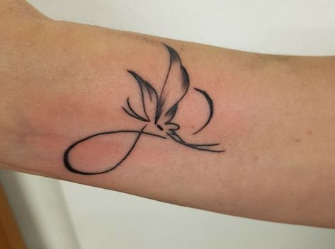 The promise of infinity with a beautiful butterfly infinity tattoo is the best gift you could dedicate to your loved ones. Find inspiration from our curated Butterfly Infinity Tattoo, Infinity Butterfly Tattoo, Infinity Tattoo Meaning, Infinity Tattoo Ideas, Infinity Butterfly, Infinity Sign Tattoo, Infinity Tattoo With Feather, Wrist Tattoos Girls, Butterfly Tattoo Stencil