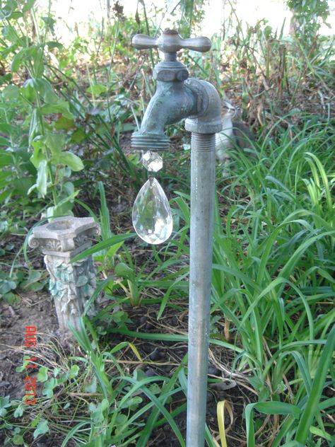 I saw this idea online and just thought it was adorable. I've had the faucet and crystal layin around the house for years, not really knowin what to do with it...until now...So I made my own crystal drip faucet for my garden Water Spigot Ideas, Spigot Ideas, Golf Club Art, Old Water Pumps, Glassware Garden Art, Backyard Cottage, Halloween Worksheets, Garden Junk, Metal Garden Art