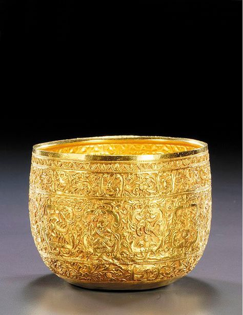 A Thai gold bowl, 20th century the sides chased with compartments containing symbols of the Zodiac, within flower and animal borders height 7.6cm, 3in Flower And Animal, Antic Jewellery, Burmese Art, Golden Bowl, Gold Bowl, Pooja Items, Gold Temple Jewellery, Silver Pooja Items, Amulet Charm