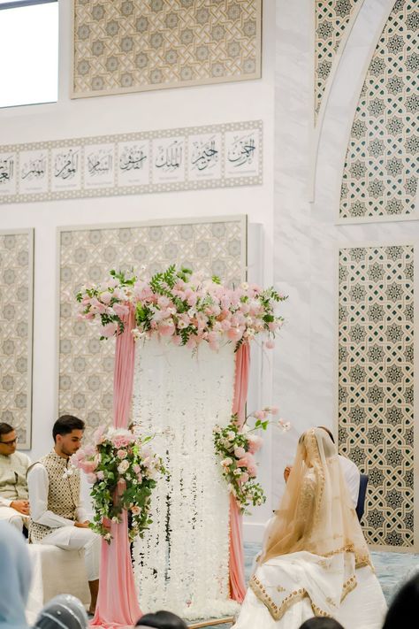 Nikkah ceremony in mosque with subtle pink, blush foral nikkah partition with decor by gowpshop and photography by gowpshop. Mosque Wedding Decoration, Pink Nikkah Decor, Nikkah In Mosque, Masjid Nikkah Decor, Simple Nikkah Decor At Home, Mosque Nikkah, Nikkah Partition, Backyard Nikkah, Outdoor Nikkah