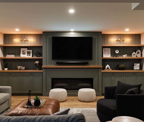 Built In Decor Ideas, Built In Entertainment Center Paint Colors, Basement Faux Beams, Basement Fireplace With Tv Built Ins, Green Built In Entertainment Center, Built In Basement Entertainment Center, Basement Living Area Ideas, Man Cave Entertainment Center, Modern Farmhouse Basement Family Room